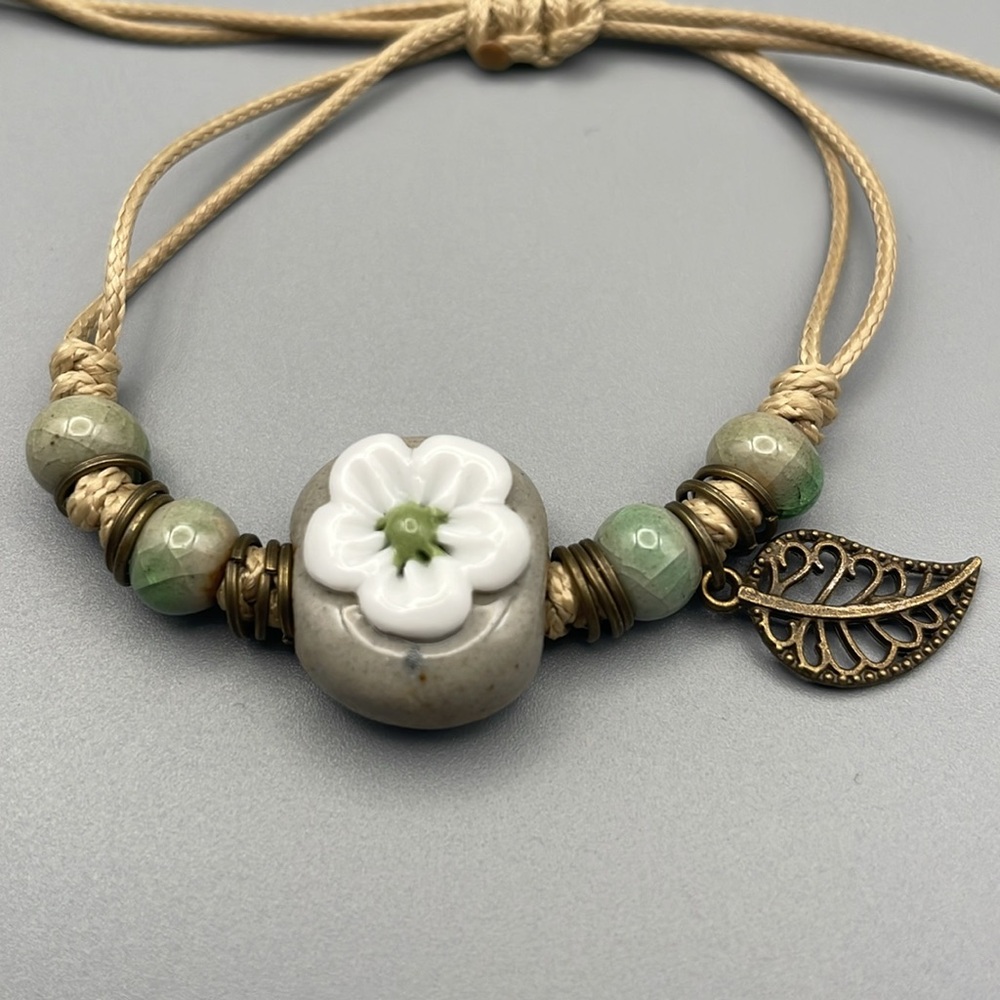 Green and Tan Bohemian Bracelet with Charms - Picture 4 of 6